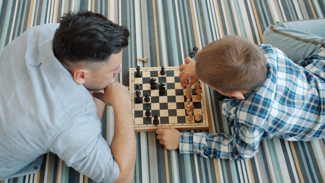 father playing with children
